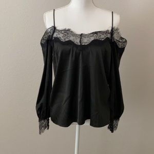Black satin blouse off the shoulder, never worn